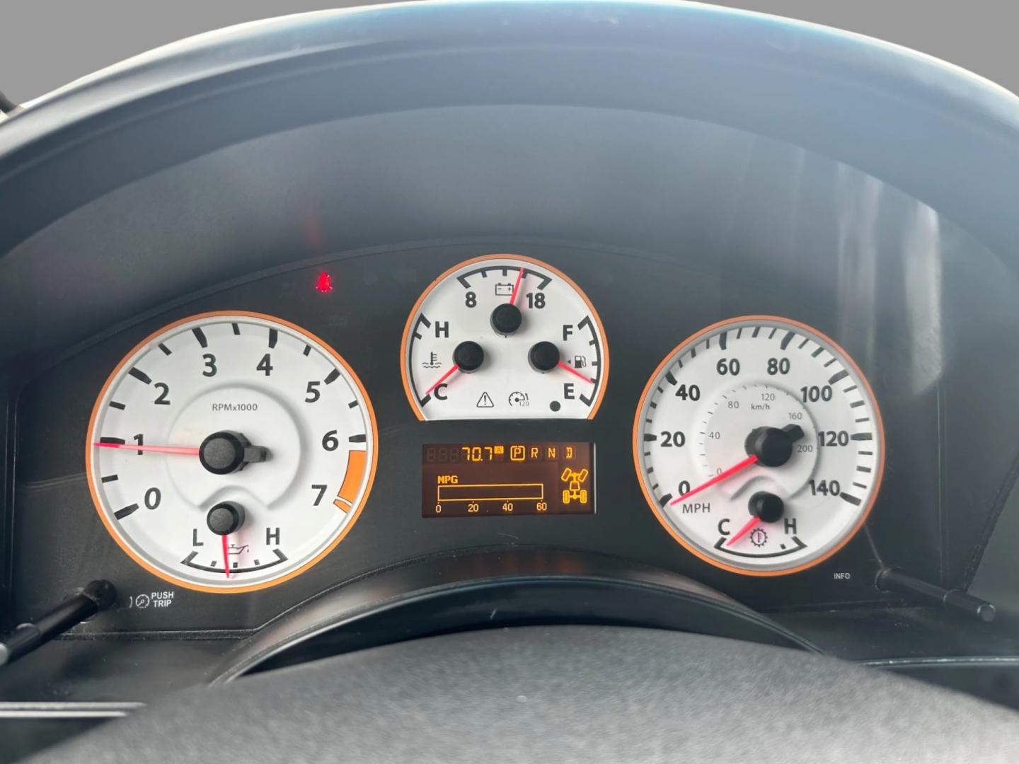 2013 White /Black Nissan Titan Pro-4X (1N6AA0EC0DN) with an 5.6L DOHC 32V V8 engine, Automatic transmission, located at 547 E. Main St., Orwell, OH, 44076, (440) 437-5893, 41.535435, -80.847855 - This 2013 Nissan Titan Pro-4X Crew Cab is a capable and well-equipped full-size pickup truck. It features a powerful 5.6L Endurance V8 engine paired with a 5-speed automatic transmission, a locking rear differential for improved traction, and a maximum towing capacity of 9,300 pounds. The truck is l - Photo#16